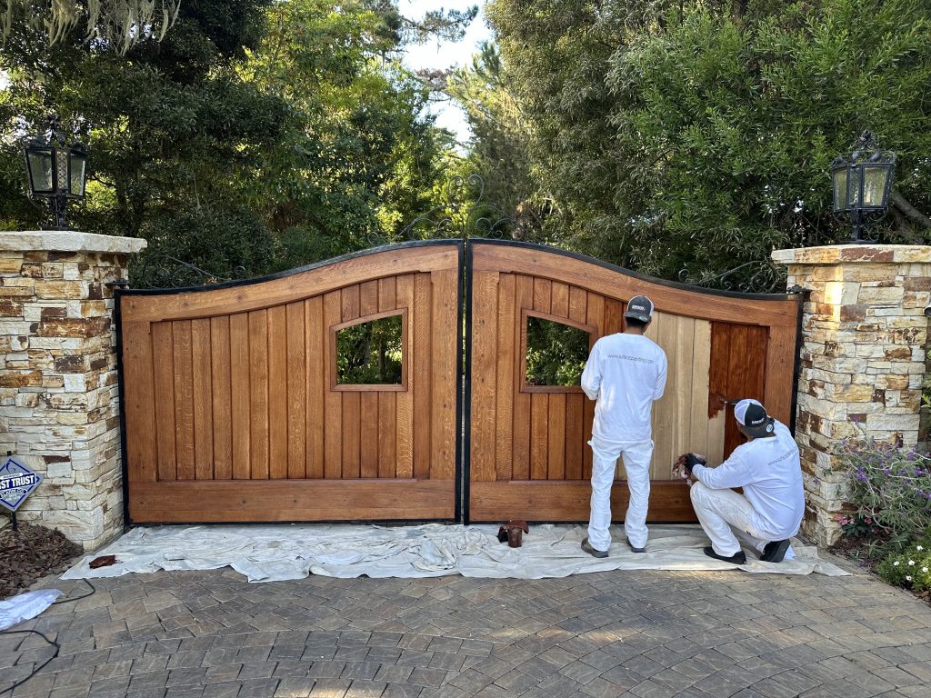 men staining gate